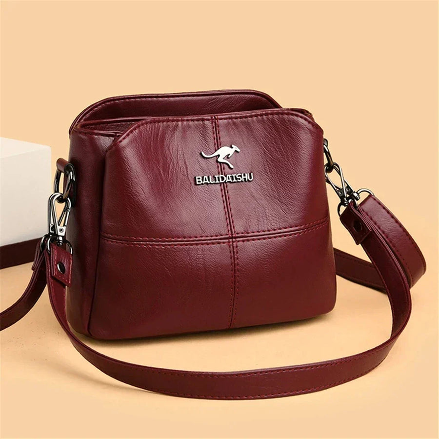 Elegant embroidered leather tote and shoulder bag for women